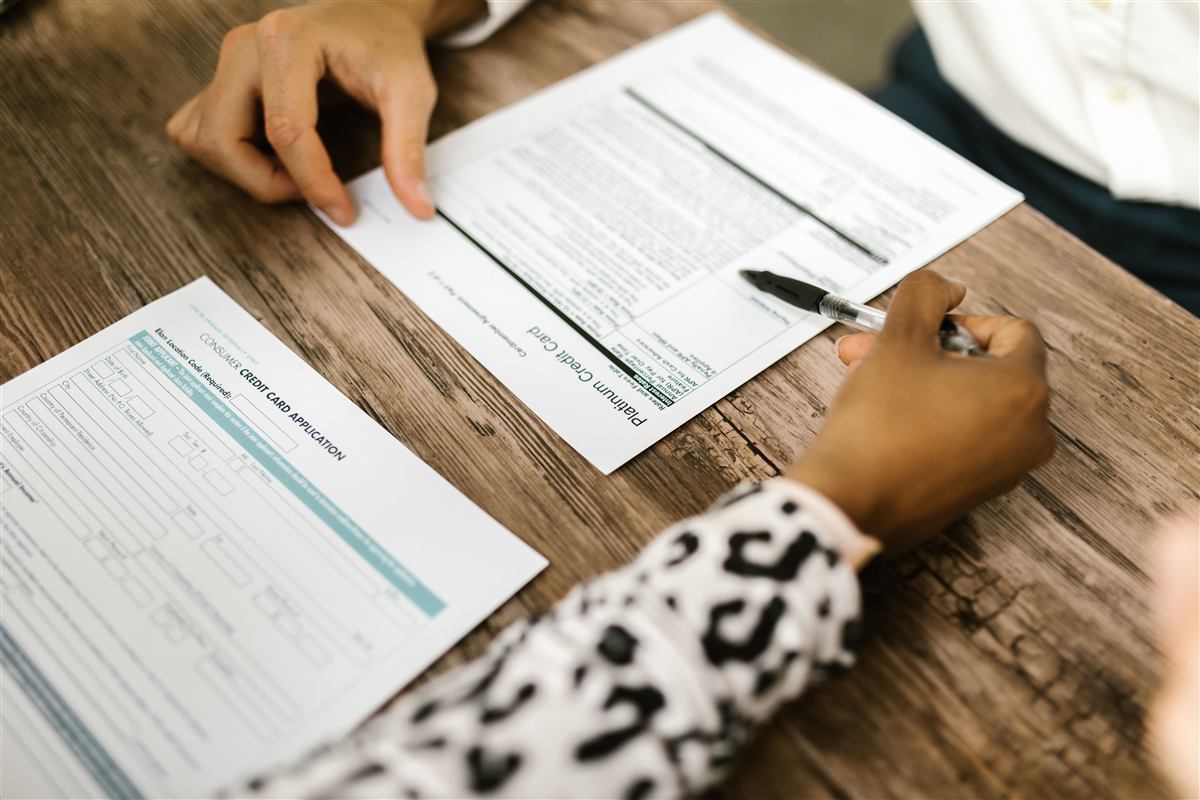 Customer reviewing paperwork before approving HVAC service